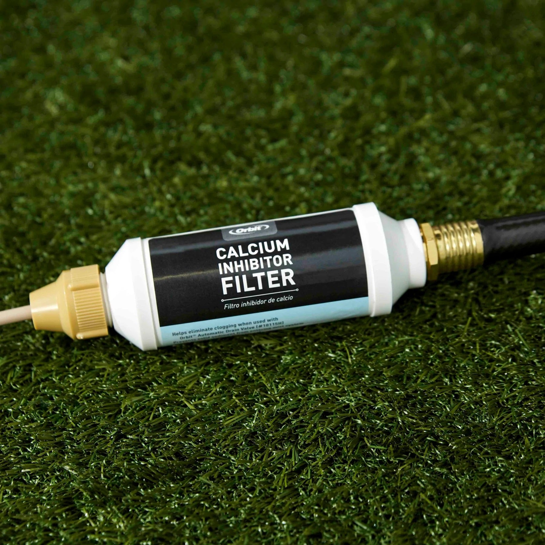 Hard Water Filter - image of the calcium inhibitor filter on green grass