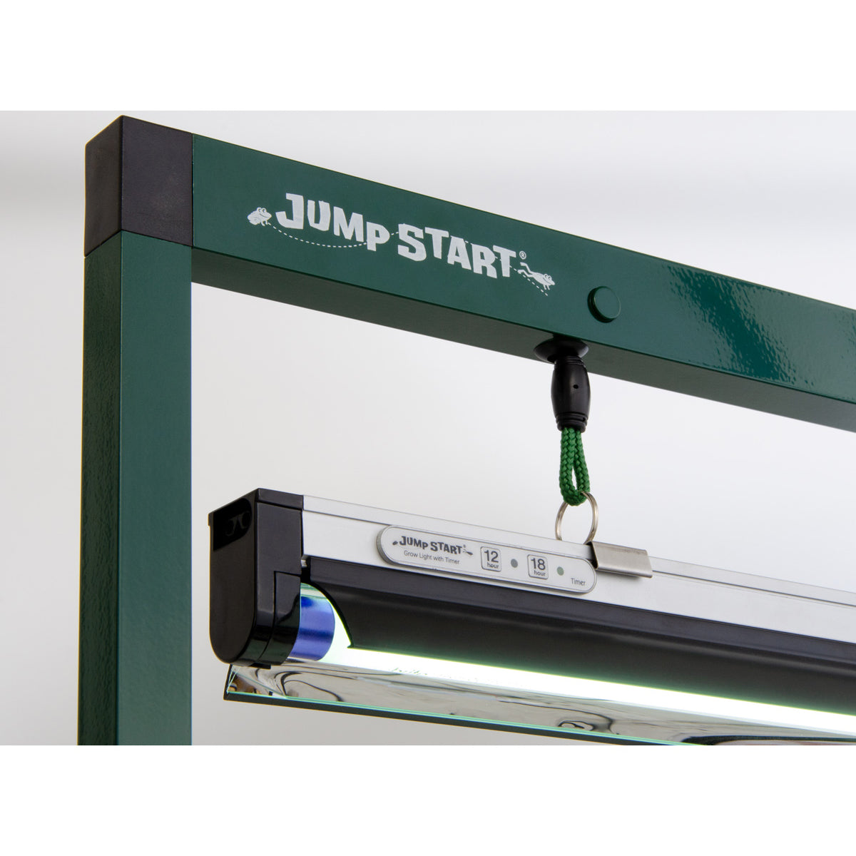 Jump Start 4 ft T-5 light fixture with timer and stand, illuminated with bright fluorescent light, showcasing the fixture mounted on a stand