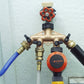Brass 4-Way Hose Manifold - being used on a faucet