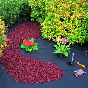 Contractor 20-Year Landscape Fabric, Weed Barrier, 3 ft x 50 ft: image of product being used in a garden