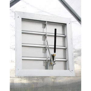 Solar Shutter Control Kit with Liberty Auto Opener: An image of the product being used in a greenhouse