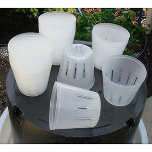 Translucent Orchid Pot with Side Slots - multiple pots on a black table